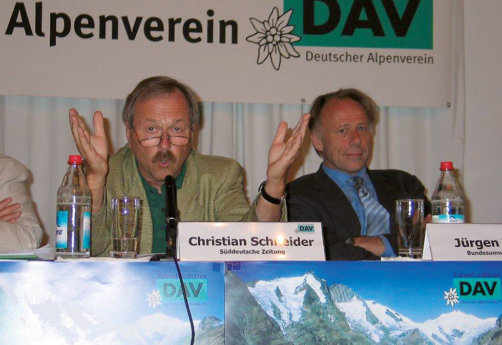 Damaliger Bundesumweltminister Trittin und Christian Schneider auf einem Podium.